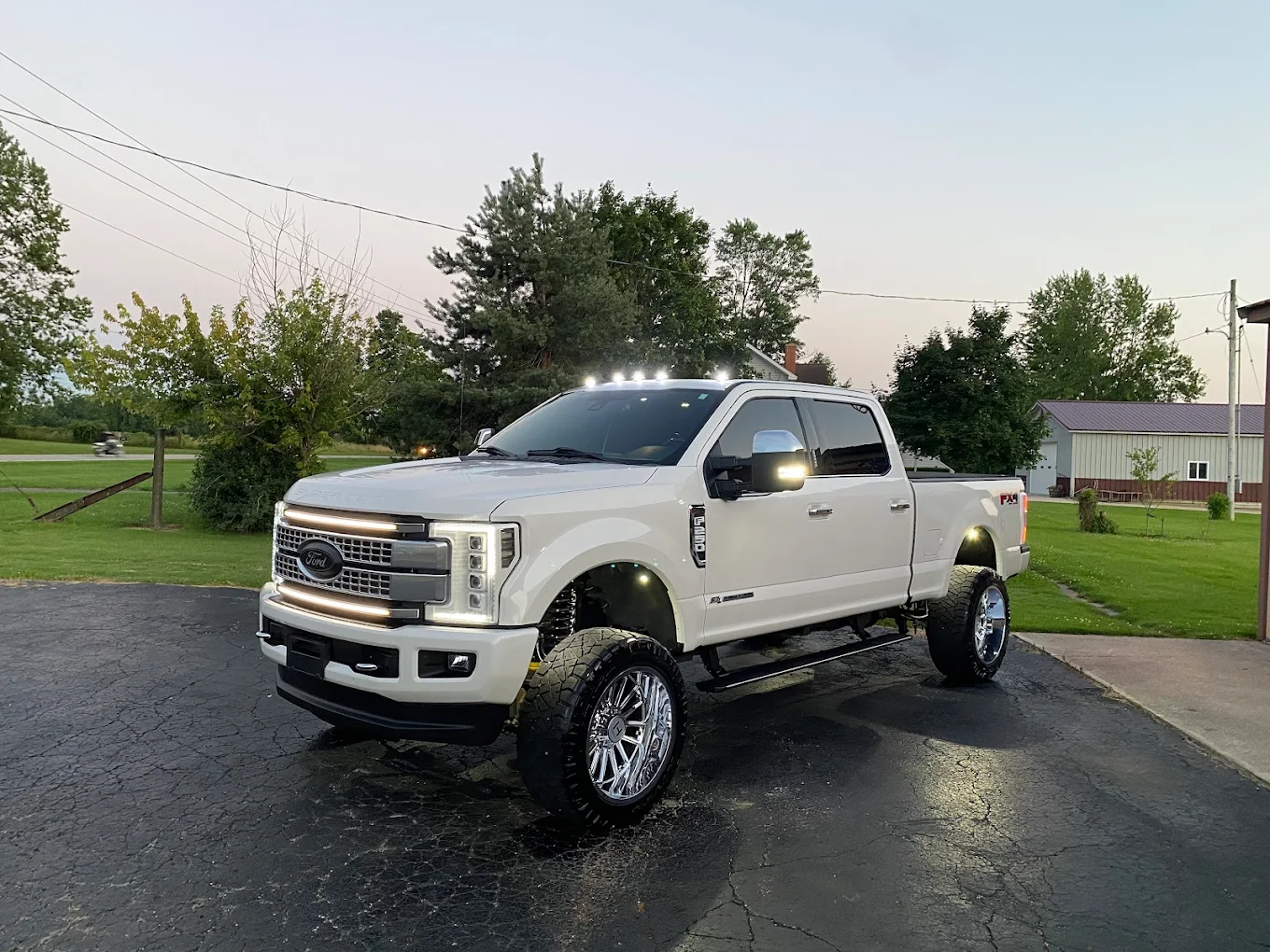 White lifted F-250 after ceramic coating